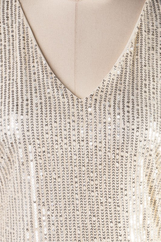 ROBE À SEQUINS COL EN V