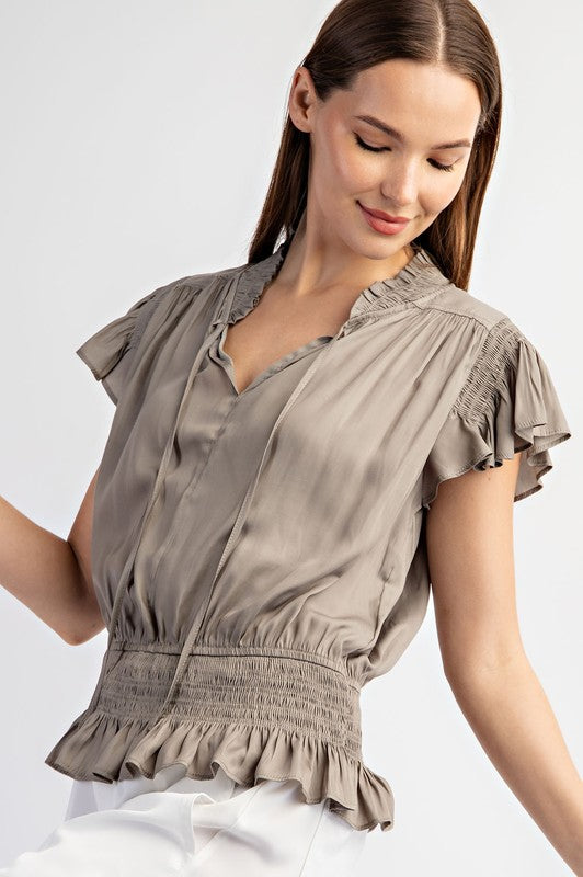 HAUT À MANCHES COURTES À SMOCKS UNI